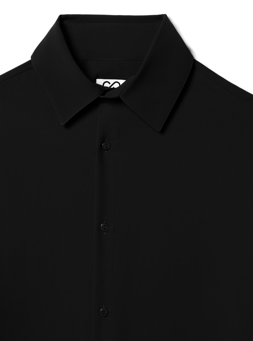 Close-up of a black silk shirt with a collar on a white background