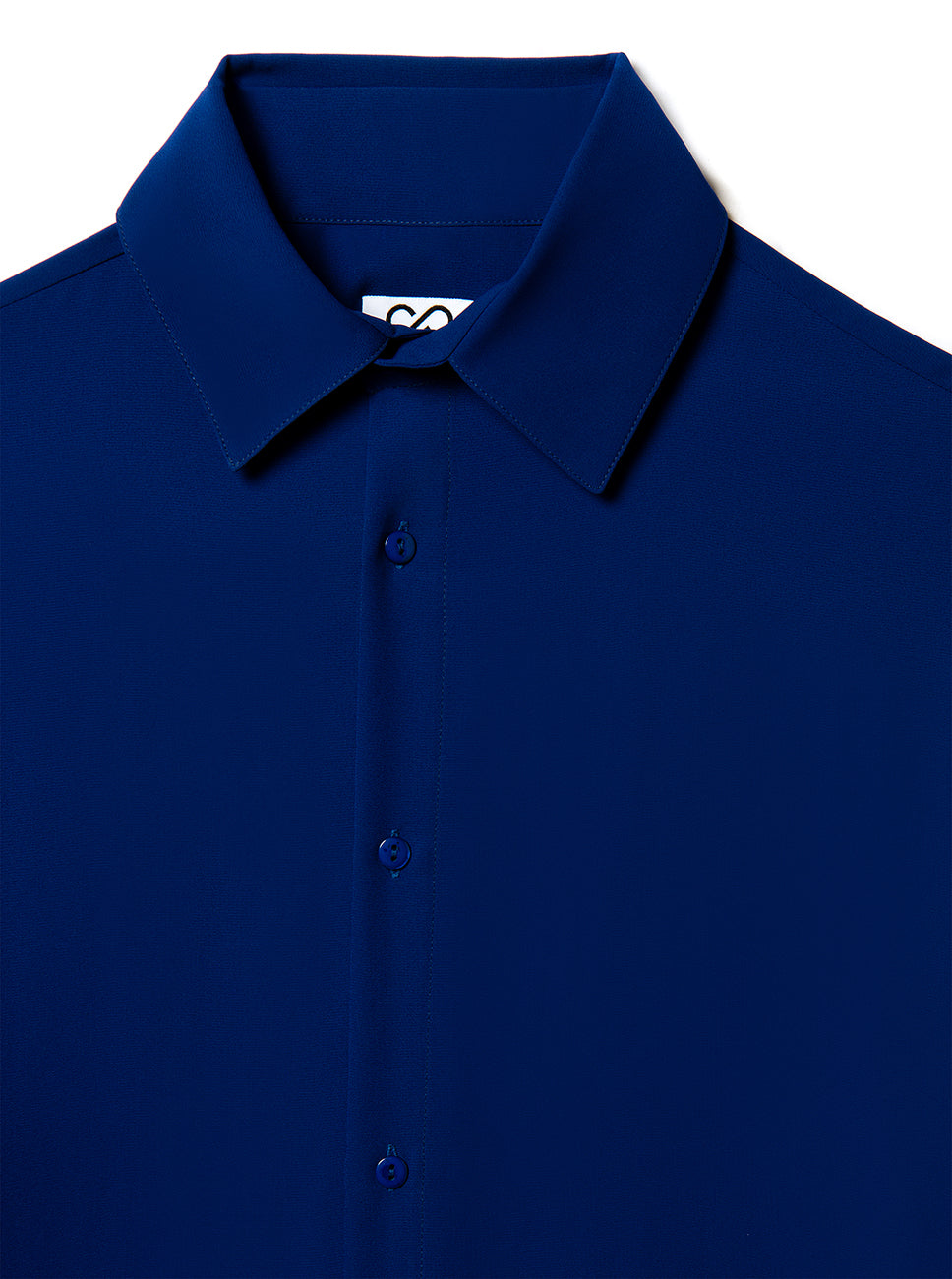 Close-up of a blue silk shirt with a collar on a white background