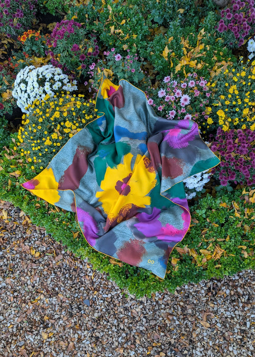 silk foulard with floral print on garden