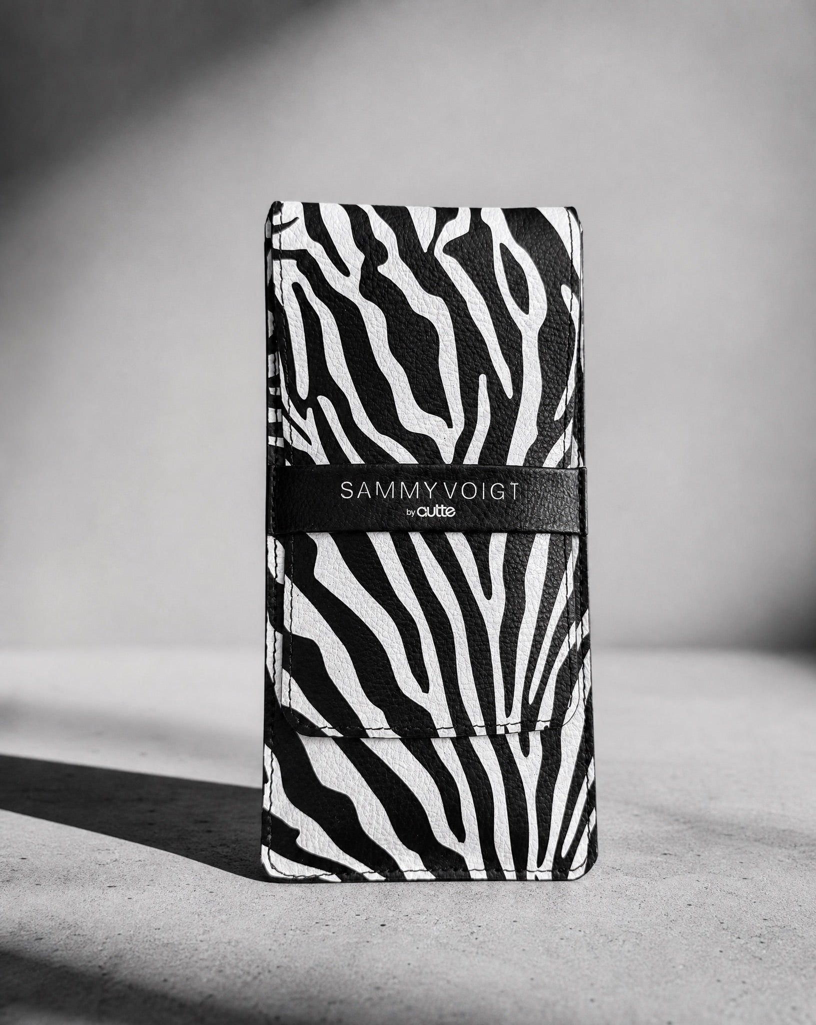 pouch  in zebra print that comes with set of 5 make up brushes
