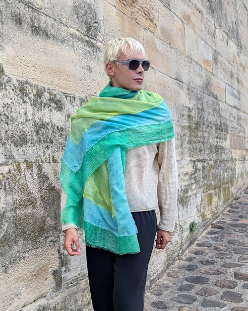 designer sammy Voigt wears patchwork scarf in shades of green