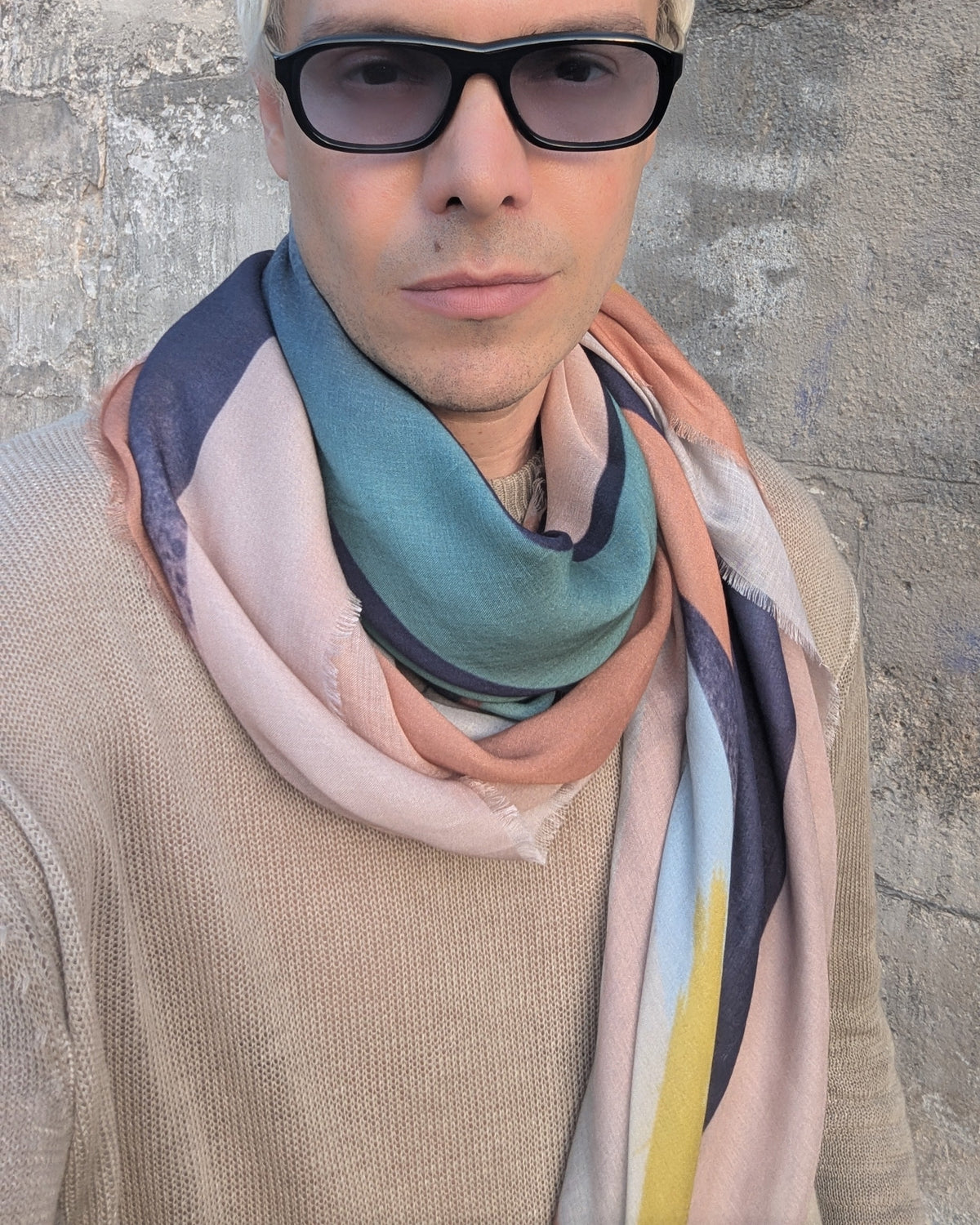 sammy Voigt wears multicolor scarf around the neck