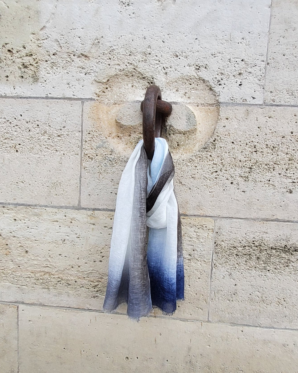 linen scarf  decorated on metail ring  wall