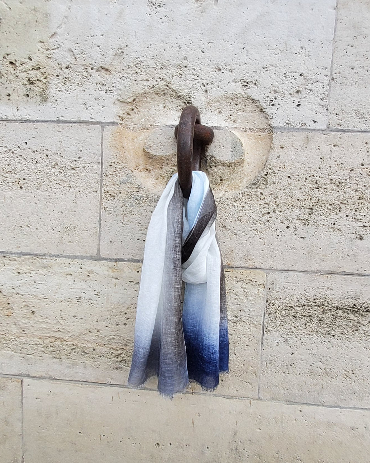 linen scarf  decorated on metail ring  wall