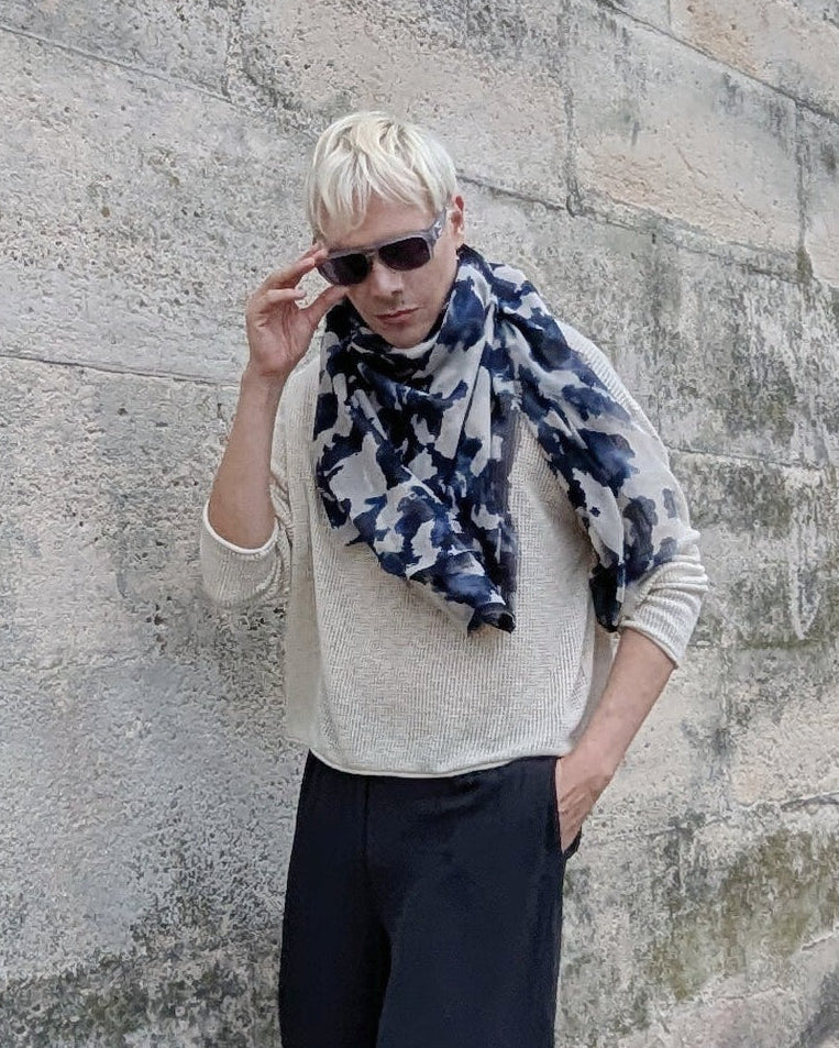 blonde model wears pure cotton square camouflage  scarf in blue shades effect abstract hand painting