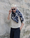 blonde model wears pure cotton square camouflage  scarf in blue shades effect abstract hand painting