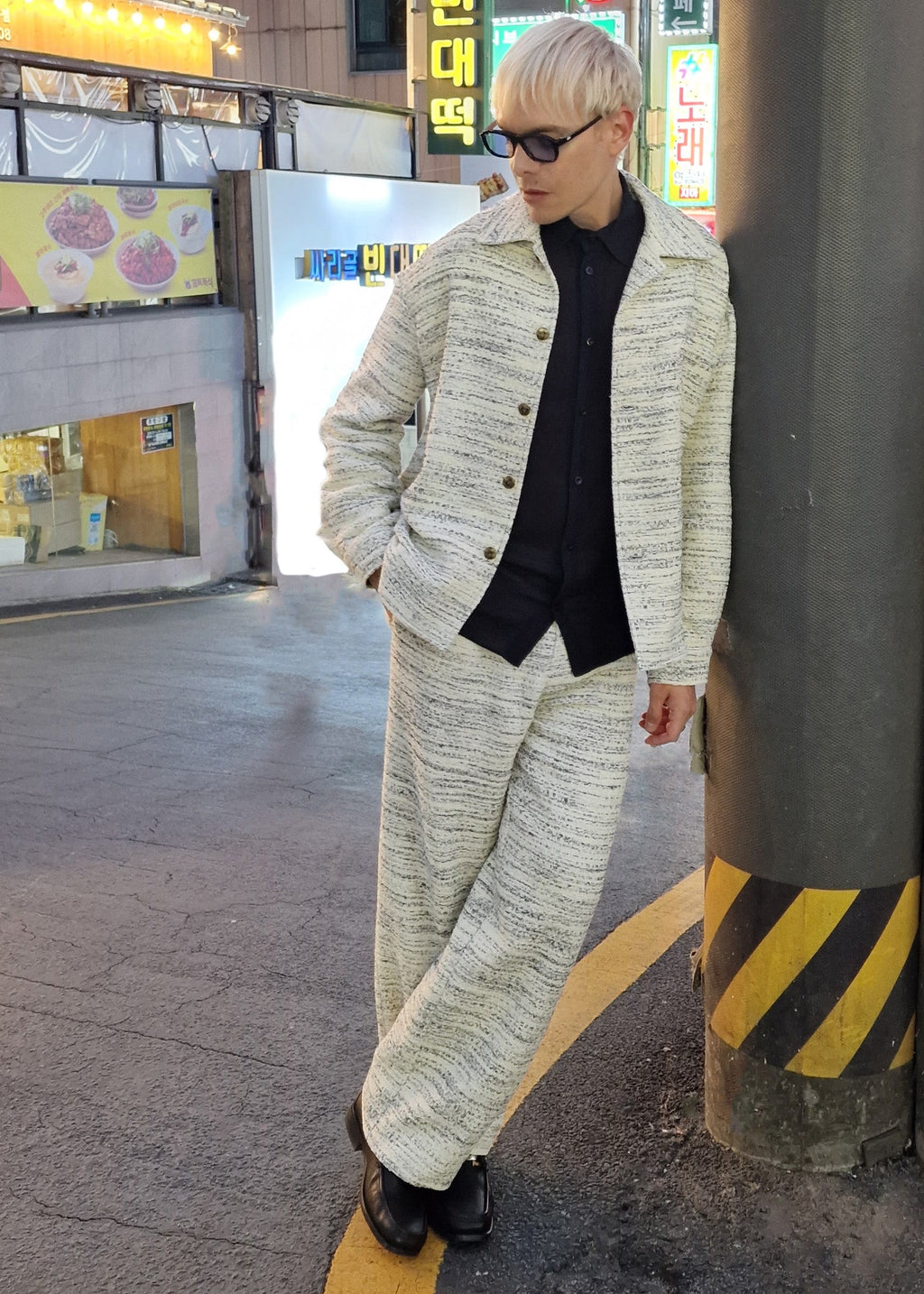 model wearing overshirt and trousers in beige tweed