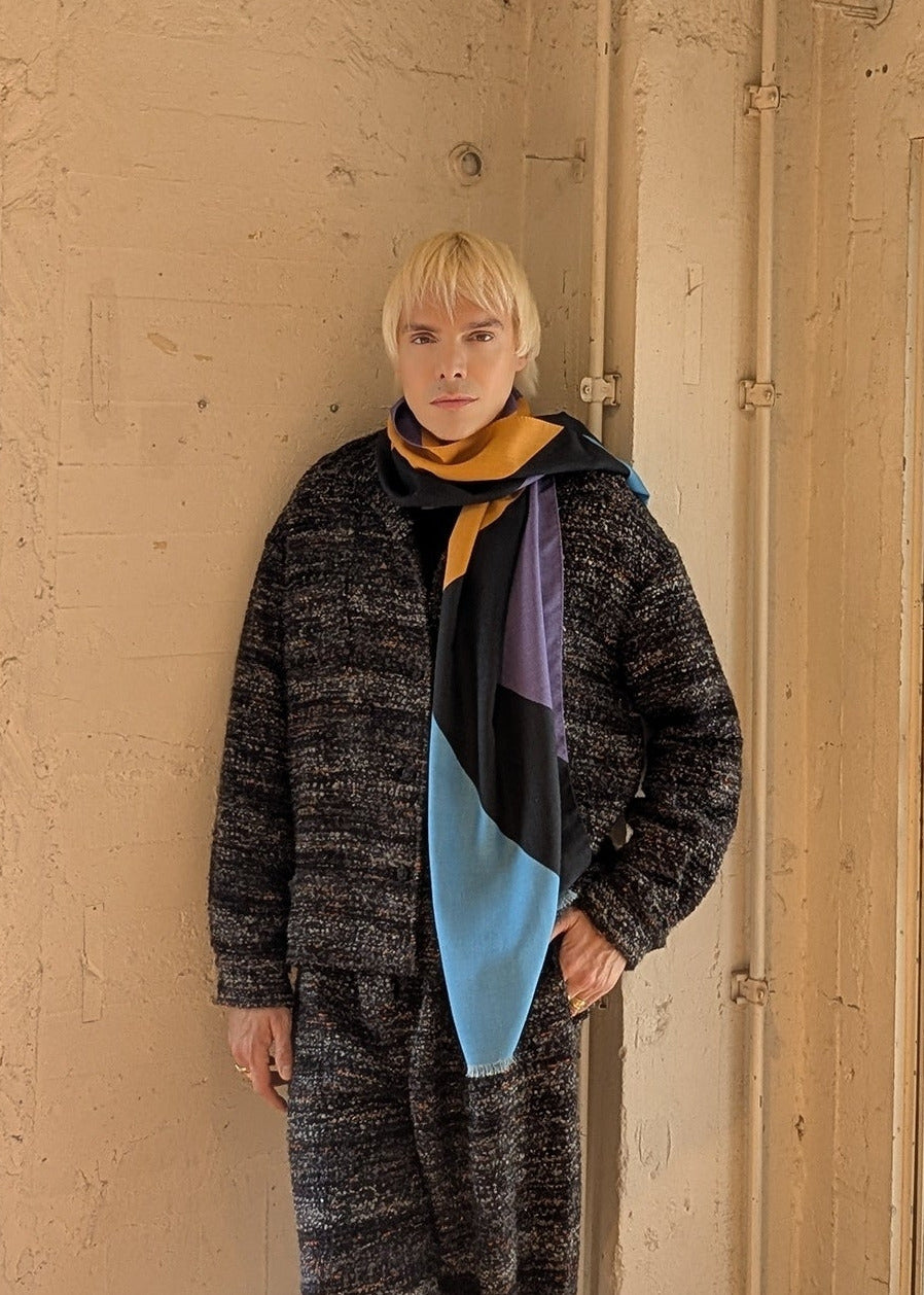 Sammy Voigt wearing blue black orange and lila scarf